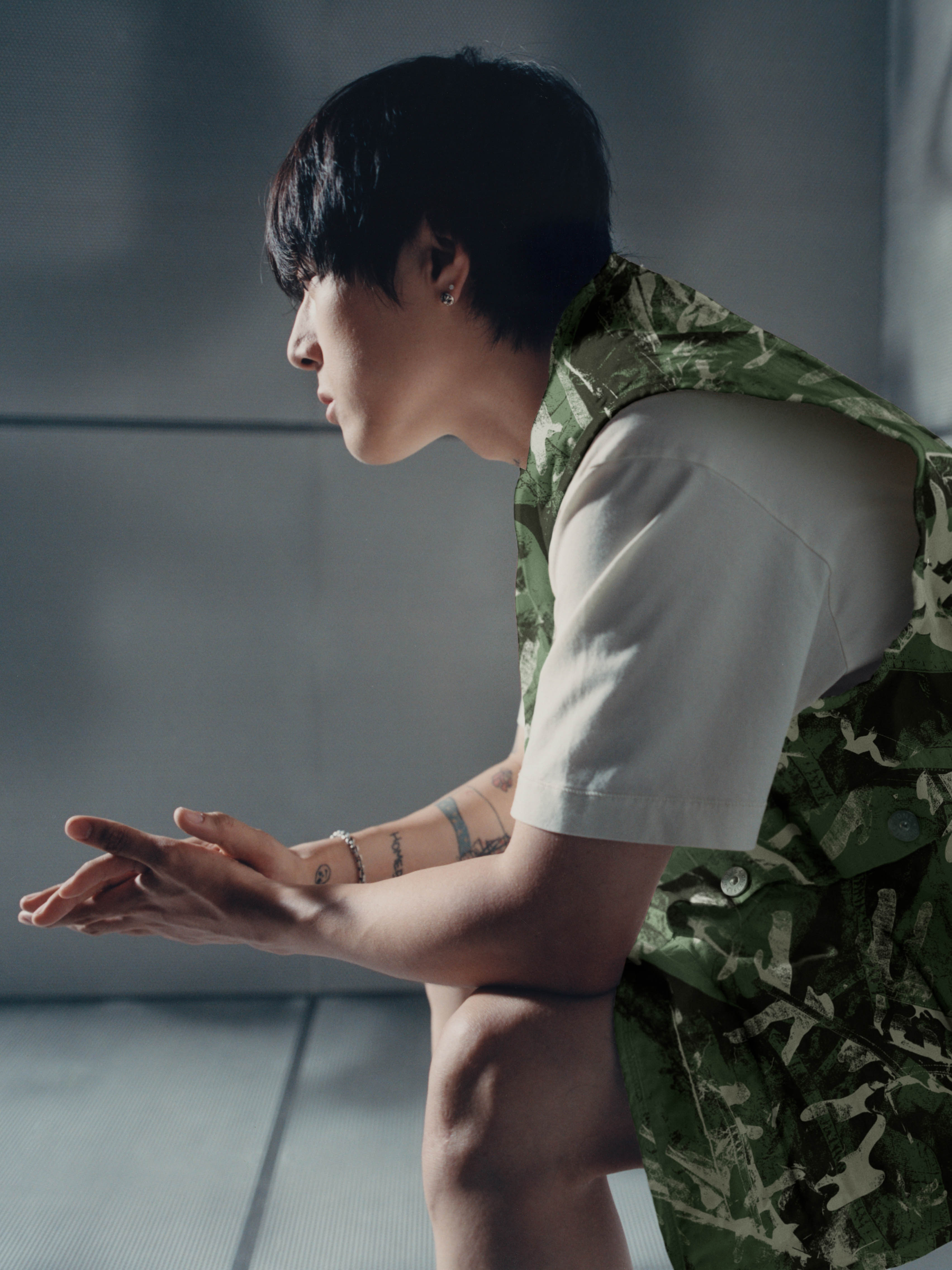Close-up of Ph-1 wearing Stone Island