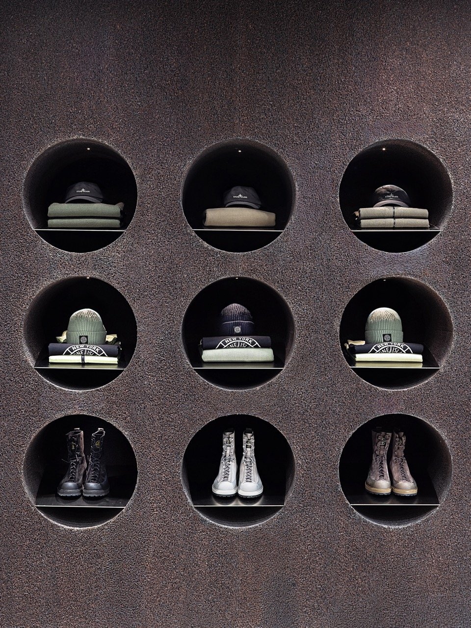 Shoea and beanies in Stone Island store at NY